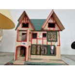 A twin gabled dolls house