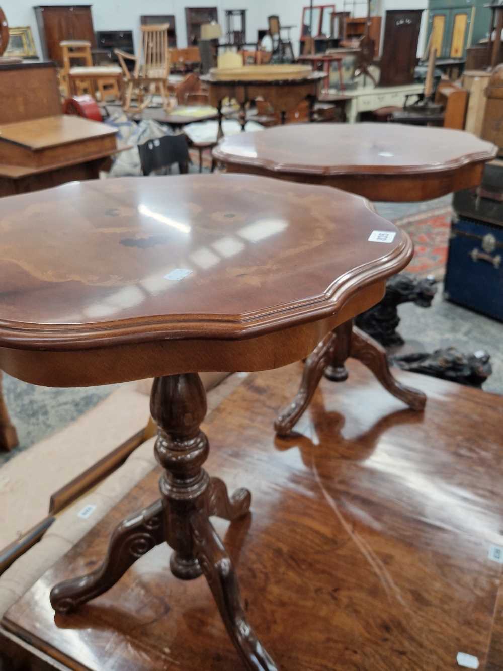 A pair of occasional tables. Modern with some minor wear and light scuffs and scratches. Diameter