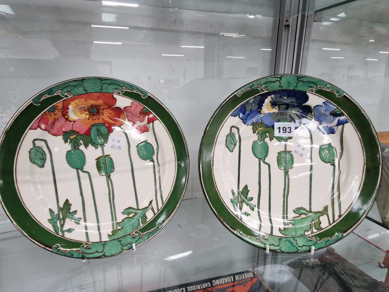Two Doulton poppy decorated plates