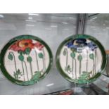 Two Doulton poppy decorated plates