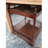 A pair of mahogany end tables.