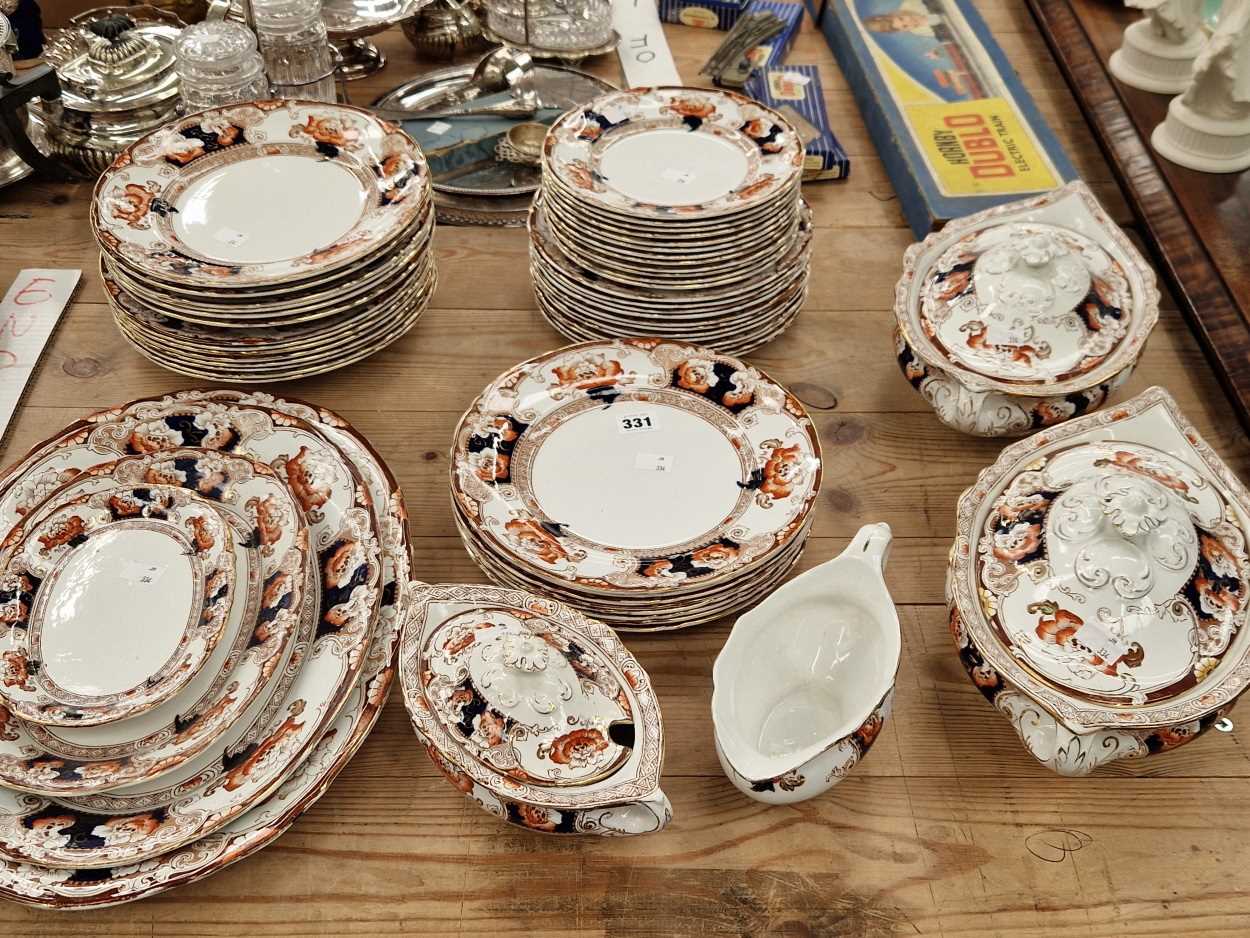 A Staffordshire Imari palette floral dinner service in the Daveport pattern