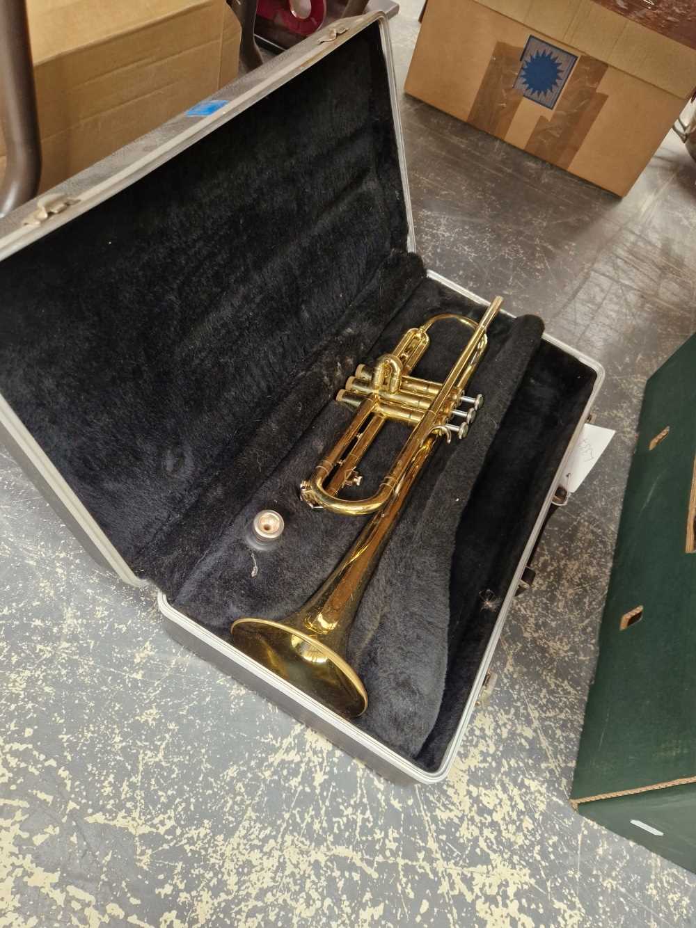 A vintage cased trumpet
