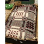 A Welsh woollen blanket There are patches of red colour run stains. 220 x 250 cm£30 plus vat to