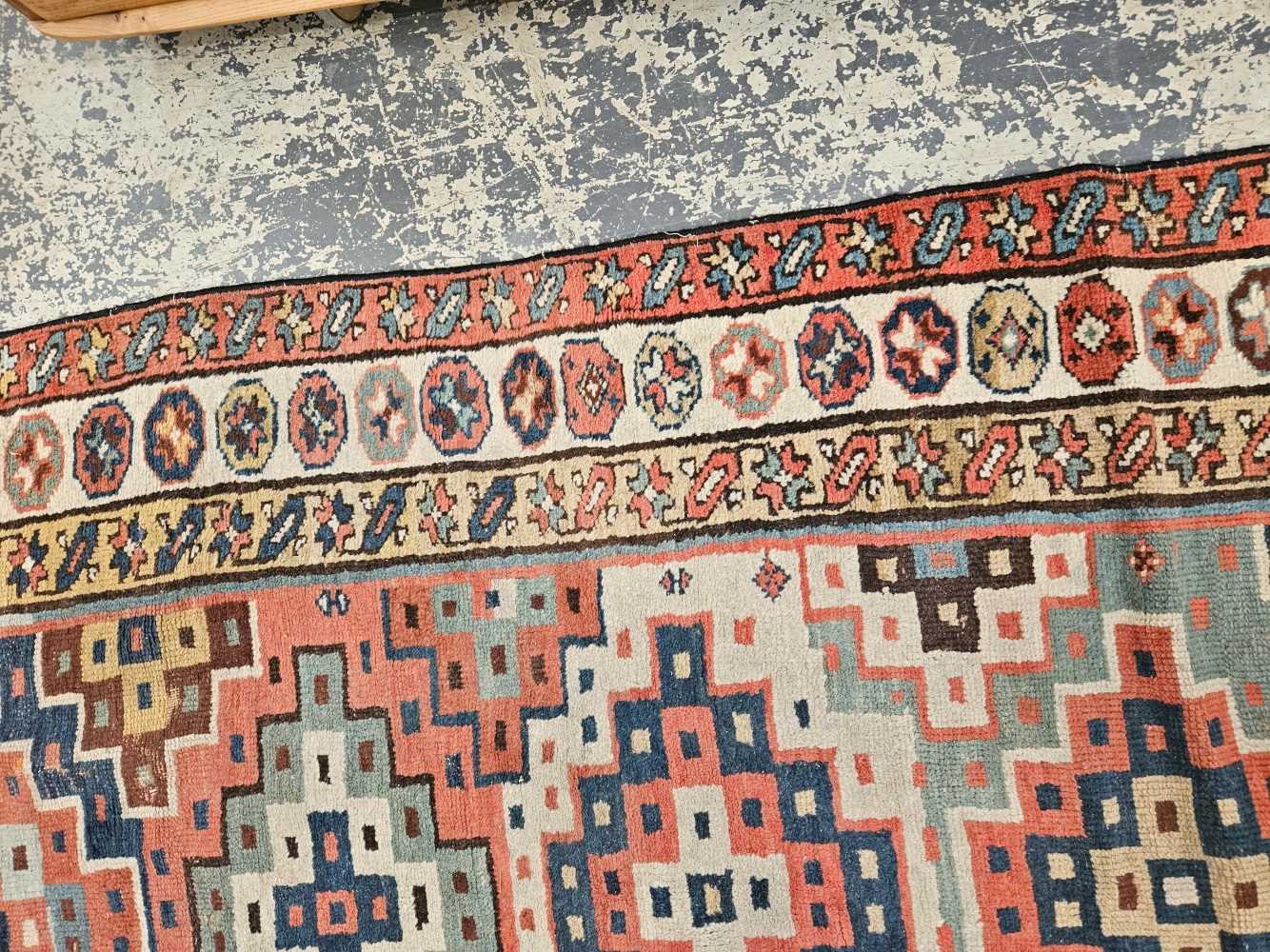 AN ANTIQUE CAUCASIAN TRIBAL RUNNER 304 x 114 cm. - Image 29 of 35