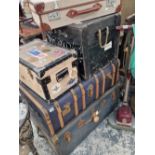 A quantity of luggage and cabin trunks.