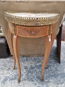 A marble topped gilt edged inlaid small demi lune hall table.