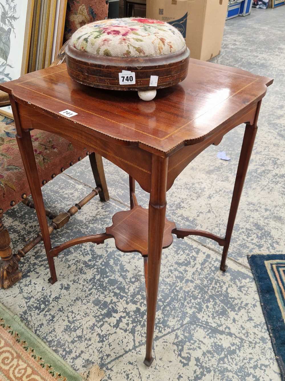 An Edwardian chequer inlaid two tier occasional table.