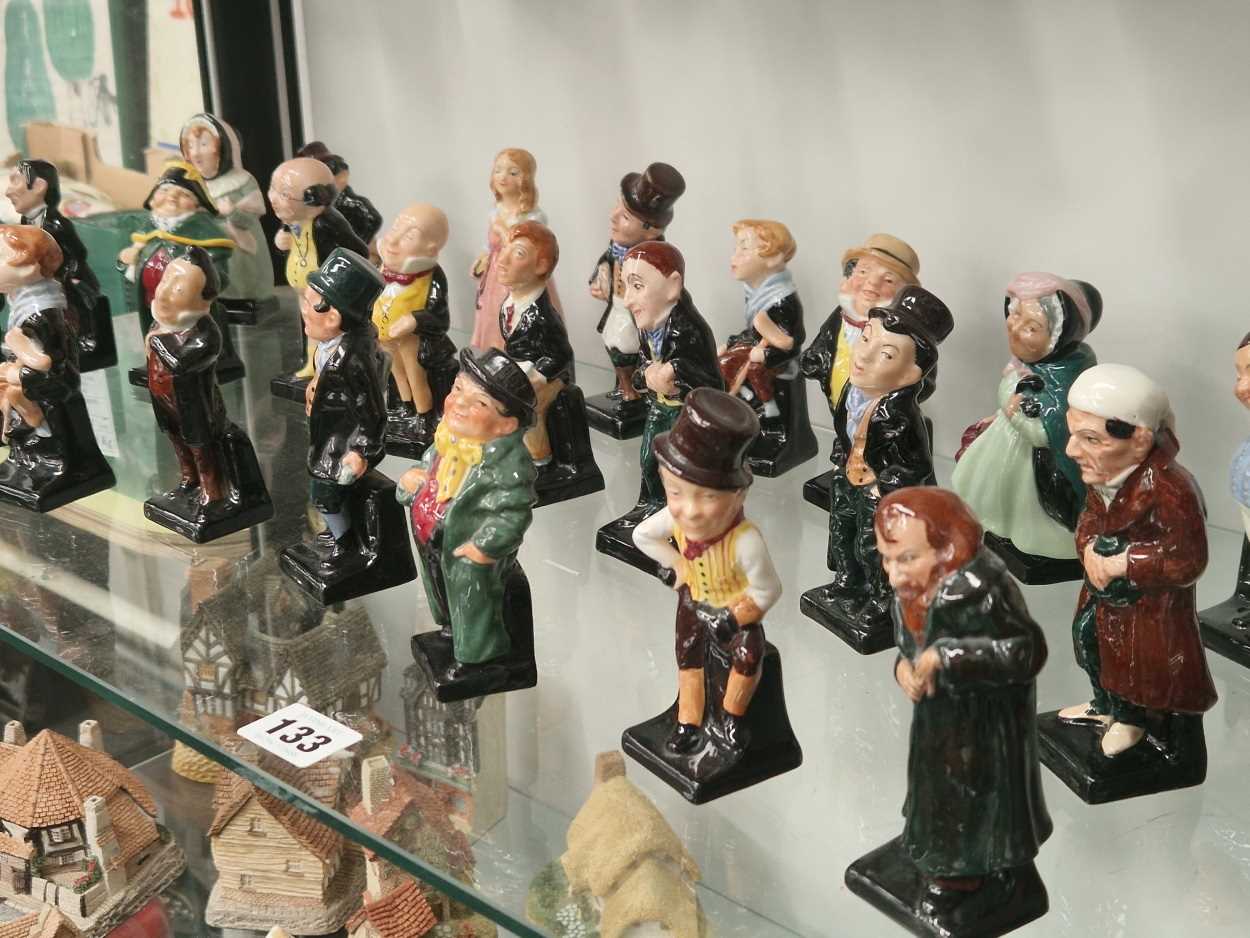 A collection of Doulton Dickensian figurines