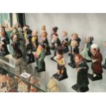 A collection of Doulton Dickensian figurines