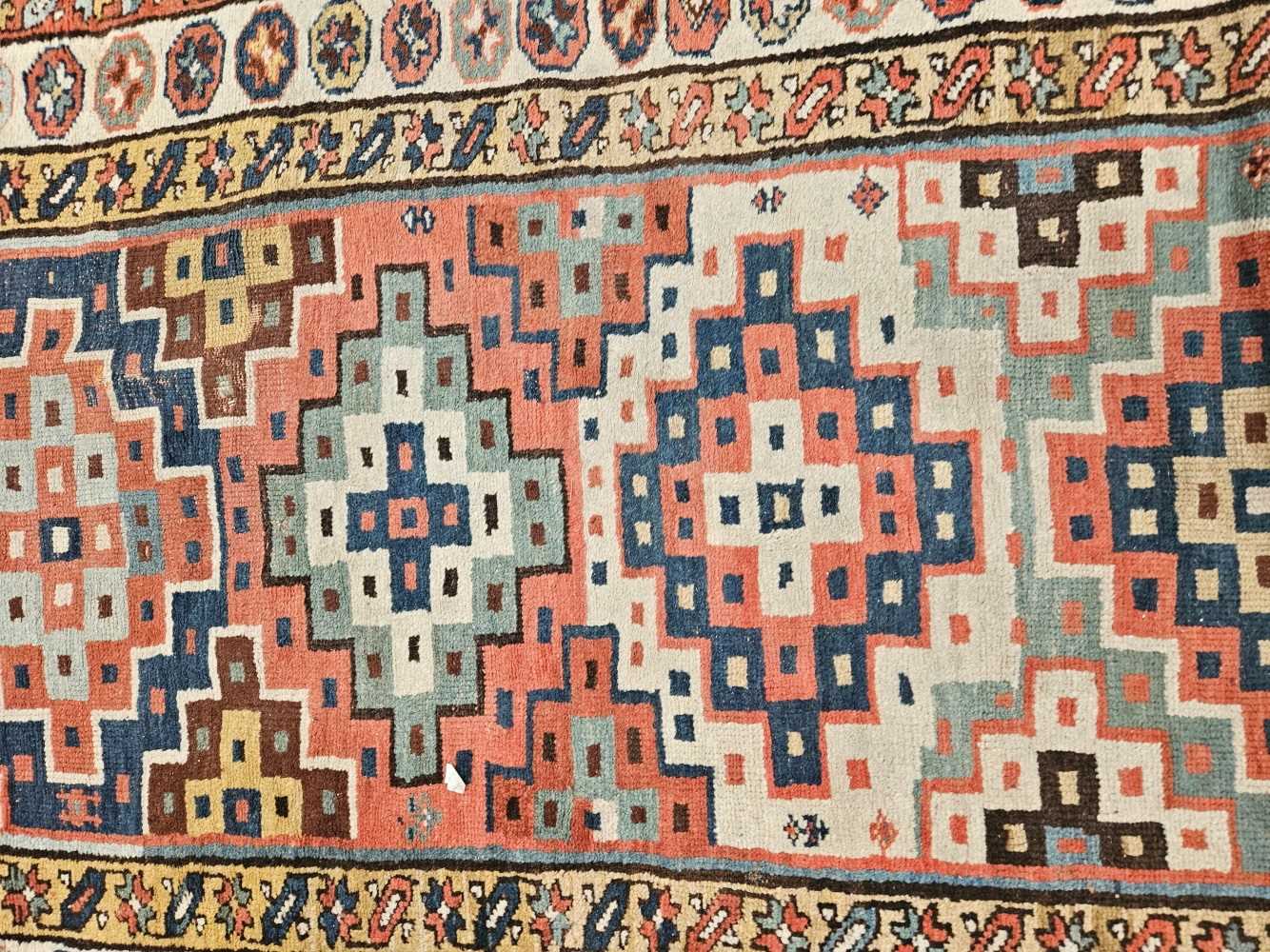 AN ANTIQUE CAUCASIAN TRIBAL RUNNER 304 x 114 cm. - Image 31 of 35