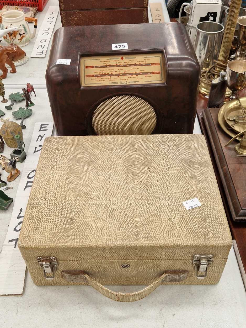 A Bush bakelite cased radio together with a suitcase presented Marconi radio