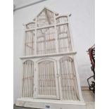 An antique style painted bird cage