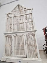 An antique style painted bird cage