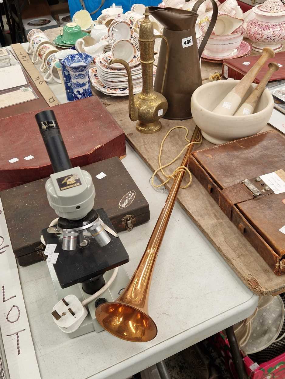 A Ravencourt microscope, a mahjong set, a mortar and two pestles, a coaching horn, a Broomfield