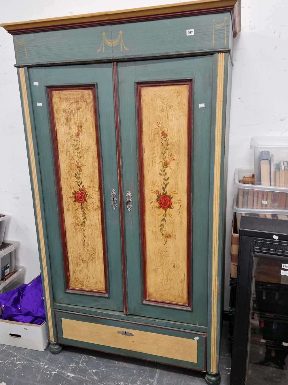 A French two door painted pine armoire.