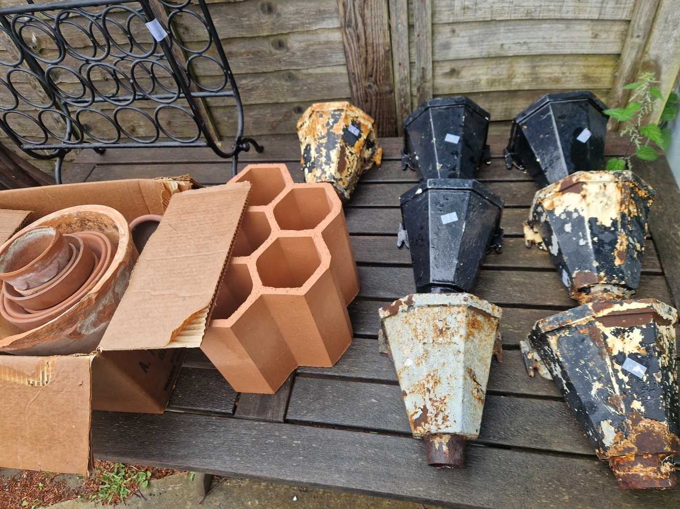 Cast iron rain hoppers, a childs bike etc