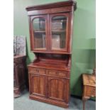 A Victorian mahogany bookcase cabinet.