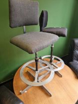 Two retro industrial type swivel stools.