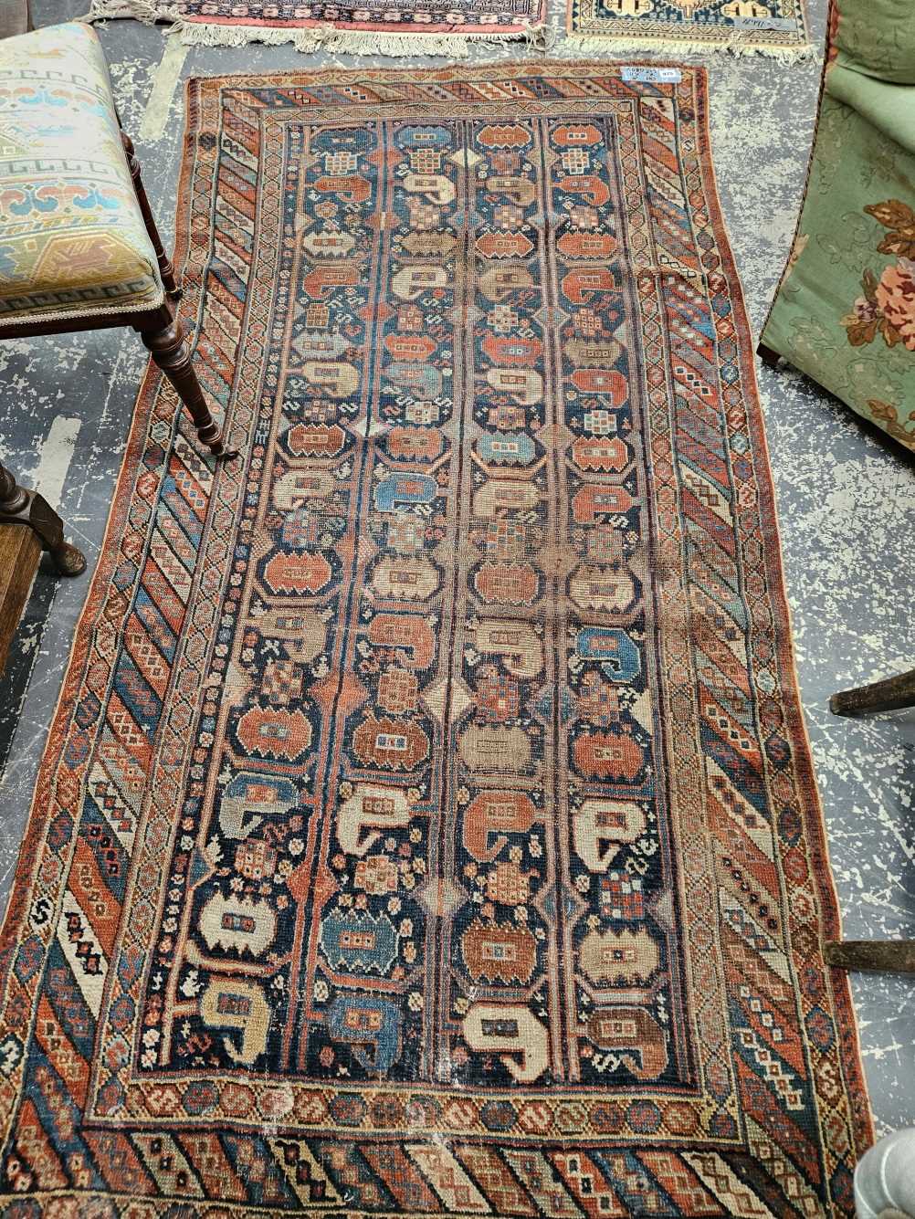 AN ANTIQUE PERSIAN TRIBAL RUG 213 x 110 cm.