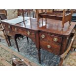 A George III mahogany break front side board.