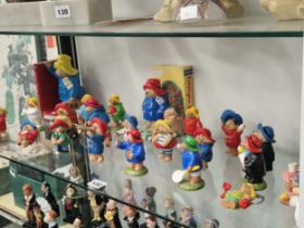 A collection of Paddington Bear figurines, some by Coalport