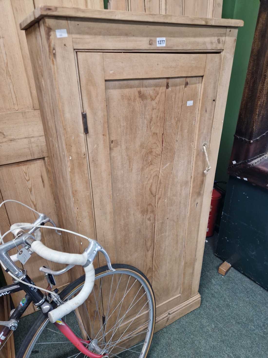 An antique pine scullery cabinet.