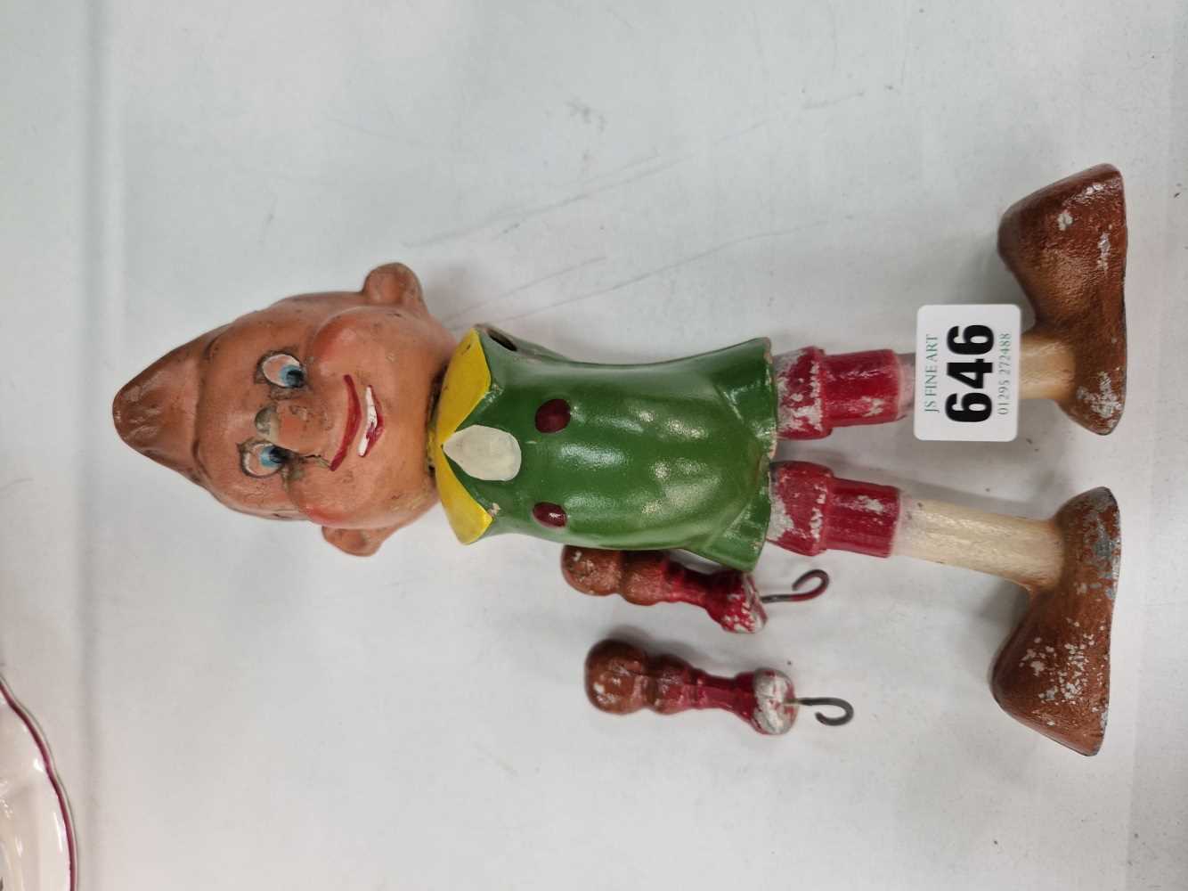 An unusual alloy and celluoid Pinocchio puppet.