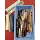 A collection of vintage and other various fountain and ballpoint pens to include Parker, Burnham,