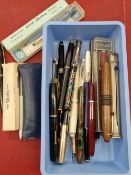 A collection of vintage and other various fountain and ballpoint pens to include Parker, Burnham,