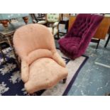 A Victorian nursing chair with salmon upholstery