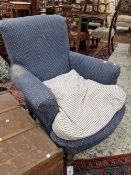 A late Victorian deep seat arm chair with feather cushion.