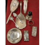 Hallmarked silver to include a Celtic style shallow bowl, a card case, dressing table items, and a