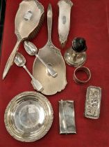Hallmarked silver to include a Celtic style shallow bowl, a card case, dressing table items, and a