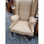 Edwardian wing back armchair.