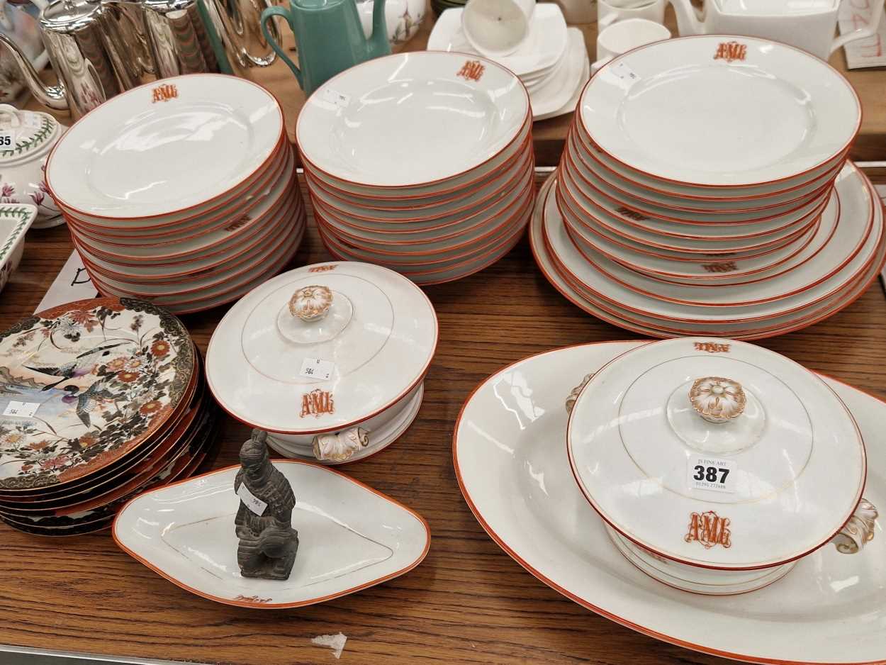 A French porcelain part dinner service initialled AMG in red together with some Japanese eggshell