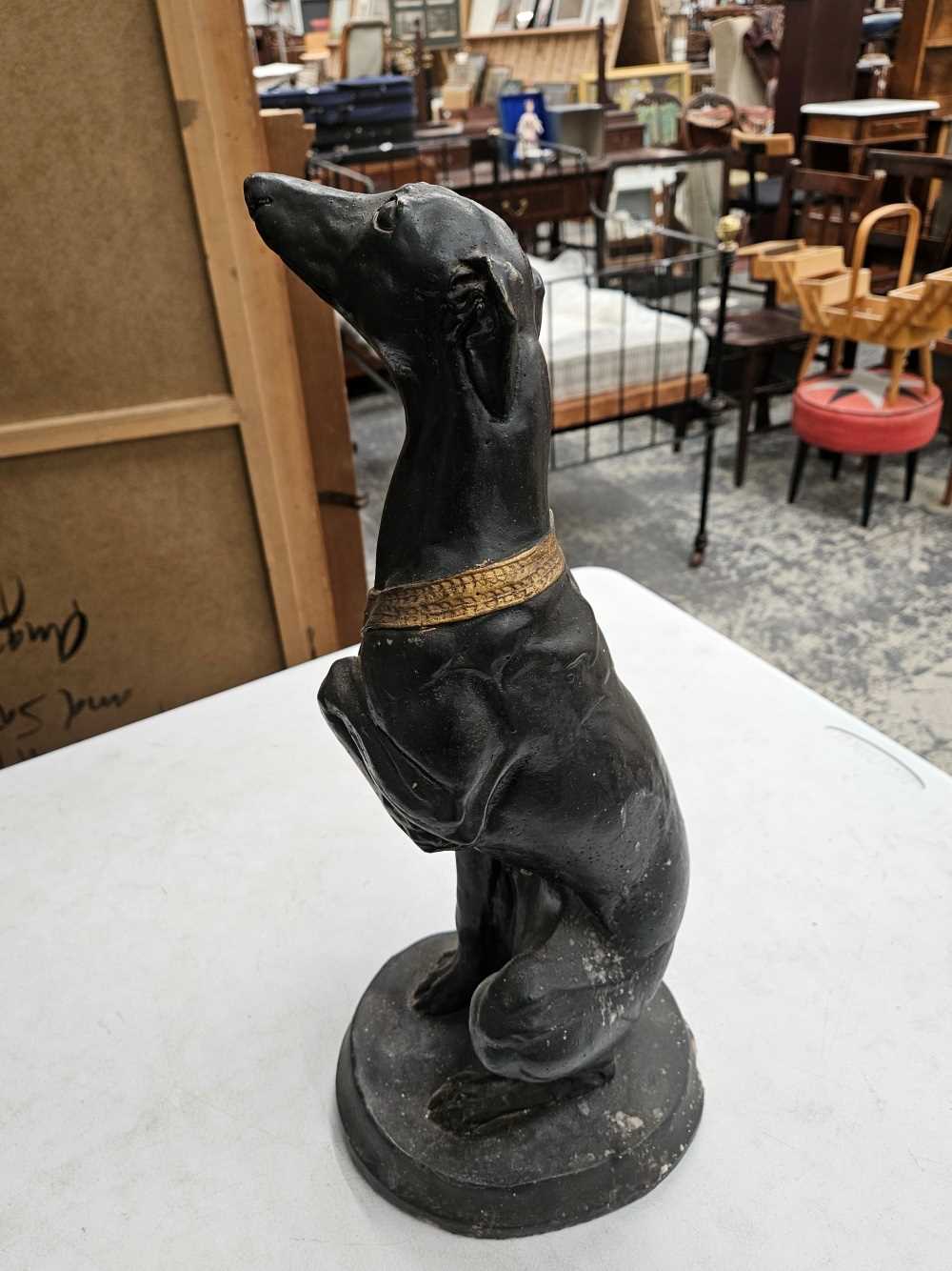 An iron bootscraper together with a plaster seated greyhound figure Chip to base of greyhound - Image 6 of 17