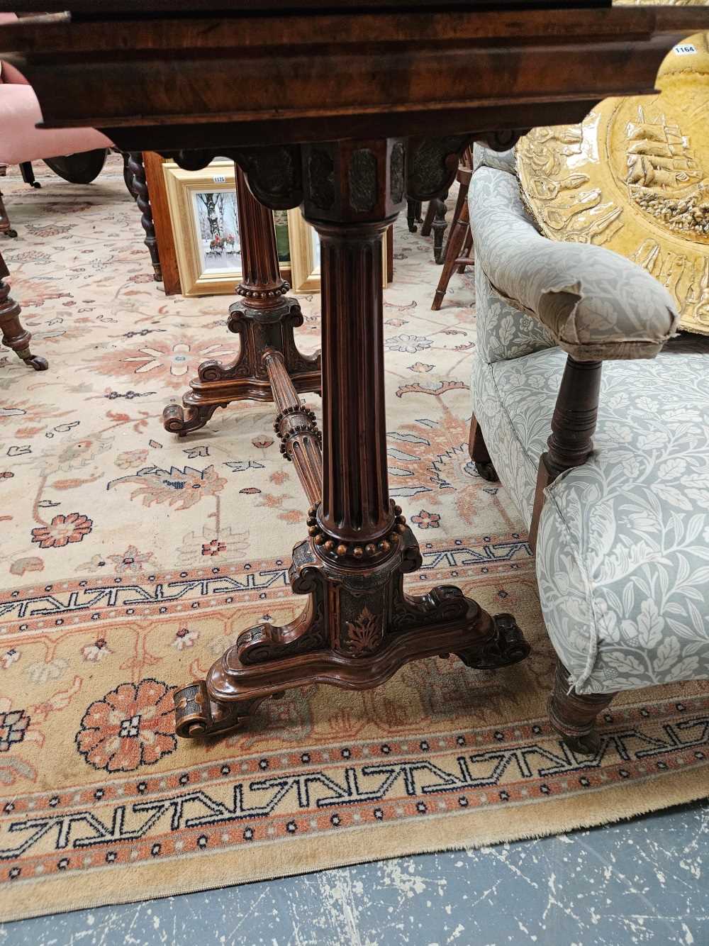 A Victorian burr walnut foldover games tables. - Image 4 of 5