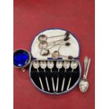 Hallmarked silver to include a set of six Henry Birks coffee spoons, a further set of six, two other