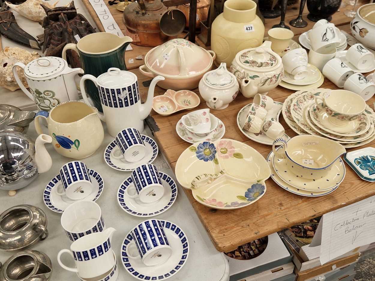 A collection of wares with various Susie Cooper designs together with collectors plates