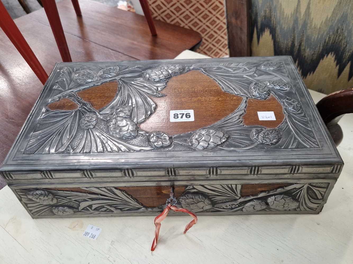 An Art Nouveau pewter mounted walnut casket box signed M.Sapia.