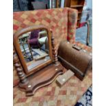 A swing mirror and a sewing machine.