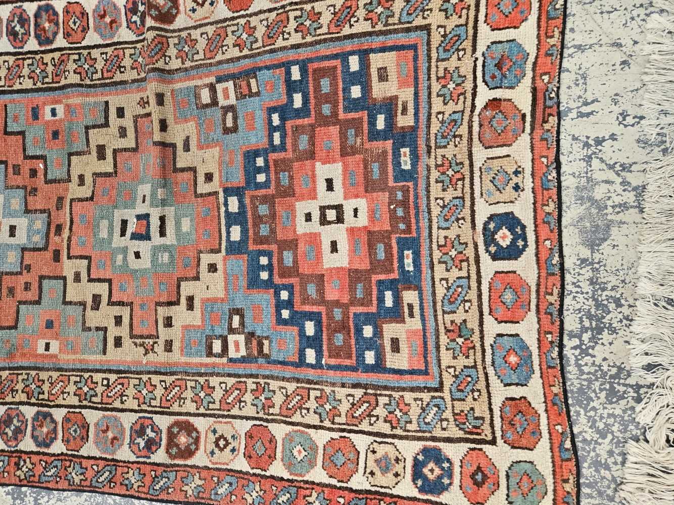 AN ANTIQUE CAUCASIAN TRIBAL RUNNER 304 x 114 cm. - Image 21 of 35