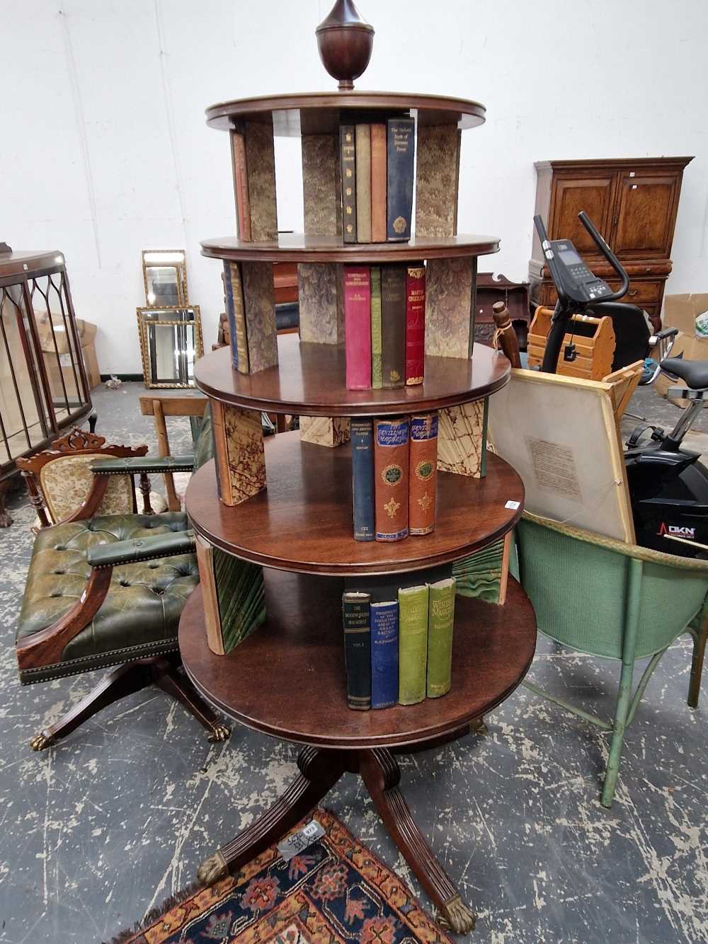 A Georgian style mahogany revolving bookcase.