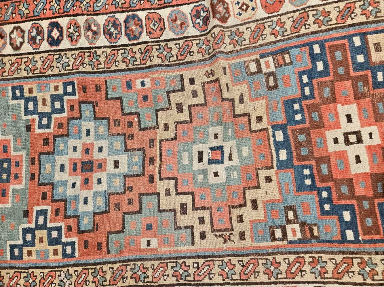 AN ANTIQUE CAUCASIAN TRIBAL RUNNER 304 x 114 cm. - Image 24 of 35