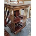 A mahogany revolving bookcase.