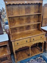 A bespoke Georgian style oak pot board dresser. W 107 D 40 H 173 cm.