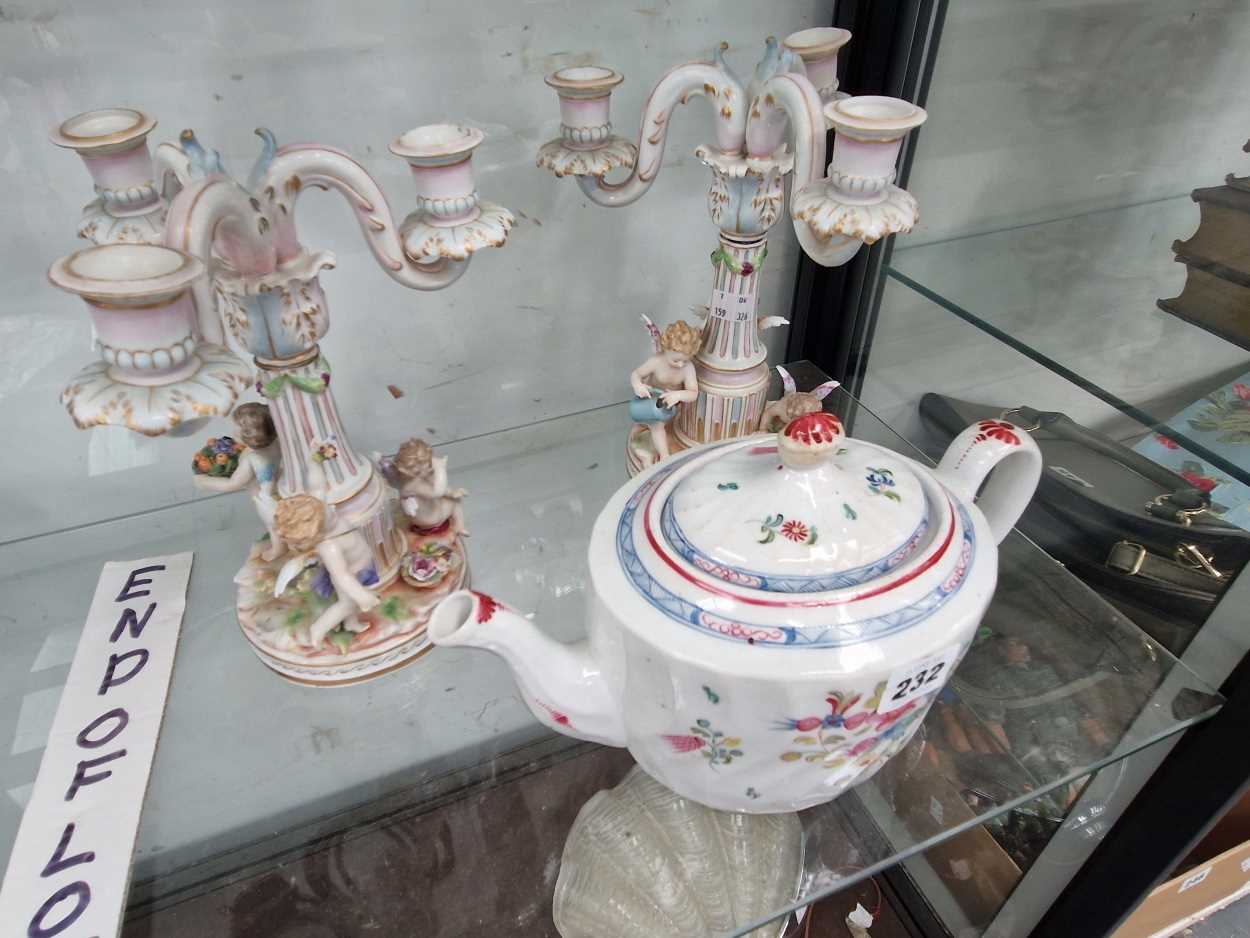 A pair of German three light candelabra together with a New Hall type tea pot