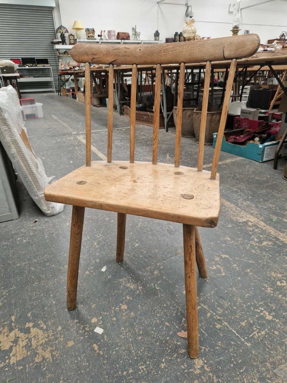 A Welsh comb back chair There is a natural split to the top right of the rail, otherwise good.