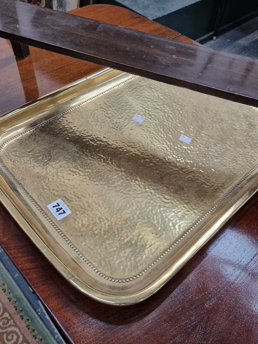 A large brass tray.